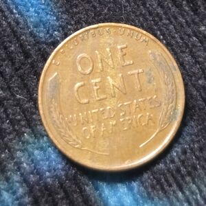This is a 1941 Lincoln Wheat CentLiberty Copper-Toned Coin
